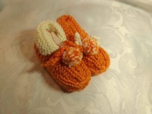 129 Scalferotti bebè con pom-pom