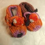 129.6 Scalferotti bebè con pom-pom